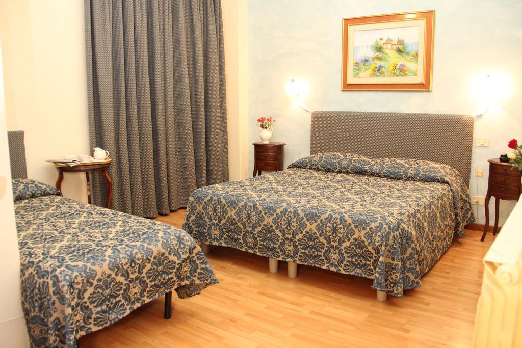 Gemini Camere E Suites Гроссето Номер фото